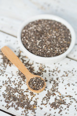 chia seeds on wooden surface