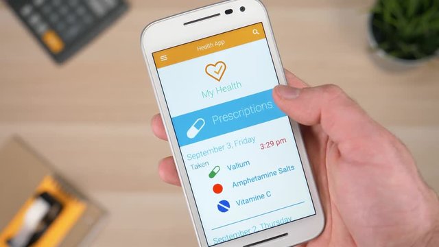 Looking at the medical prescription on a smartphone app.