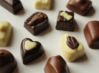 Pralines made of various chocolate types