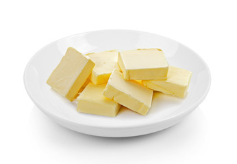 butter in plate on white background