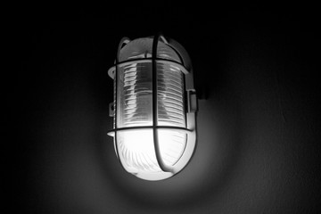Industrial light shining through the darkness