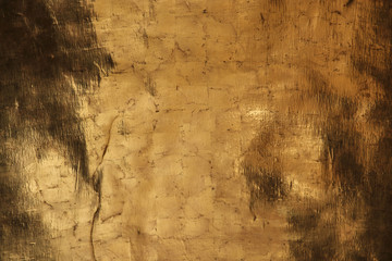 Gold wall texture background with dimming elements - Powered by Adobe