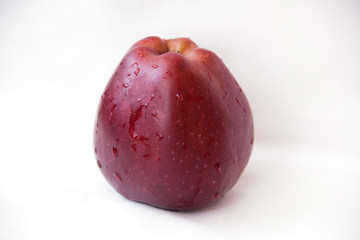 red Apple with water droplets