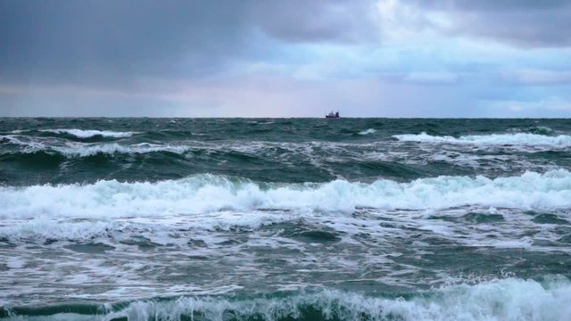 Stormy seas during bad weather cyclone hurricane Winds. Slow motion sea ocean water big surf wave splash beach. Atlantic Miami, Florida,