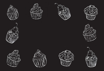 Sketches of cake, cup cake hand-drawn with chalks on blackboard.