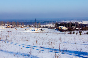 snow-covered village on a frosty winter day