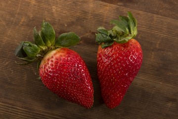 Fresh Red Strawberries Shot From Directly  Above in Studio on Brown Wooden Background