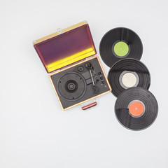 Fototapeta premium Old vinyl turntable player with record isolated on a white background