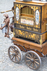 Old barrel organ with the monkey toy, Berlin