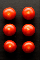 Cherry tomatoes on the table view from the top