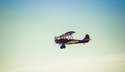 Biplane in the sky, in the air