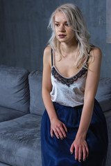 Fototapeta premium girl sitting on the couch