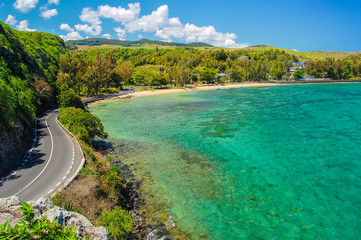 View of scenic coastal road along ocean on Mauritius Island