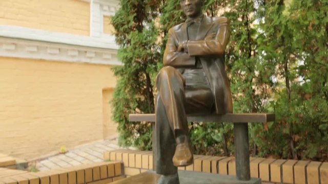 Kiev, Ukraine - October 11, 2017: Monument to famous writer Mikhail Bulgakov, Kiev Ukraine. Mikhail Bulgakov was a Soviet writer of the 20th century. Hes well known novel is The Master and Margarita