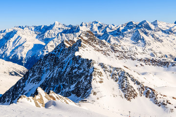 Fototapeta na wymiar Mountains covered with snow in Solden ski area on beautiful sunny winter day, Tirol, Austria
