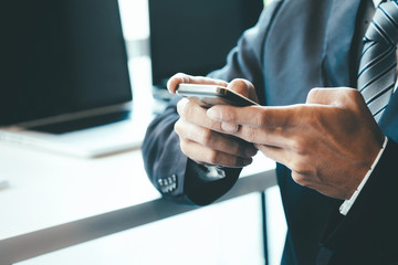 Businessman using mobile phone