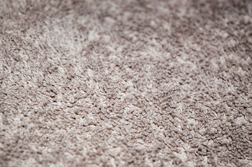 Closeup of beige towel texture, fibers of bath towel background