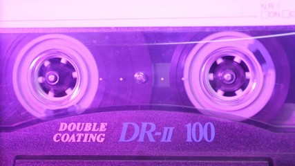 Audio Cassette in the Player. Close-up - Powered by Adobe