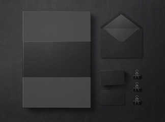 Mock up. Set of elements on black background. Blank objects for placing your design. Folder, envelope and business cards. Top view. 