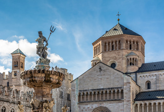 Trento city: main square Piazza Duomo, with clock tower and the Late Baroque Fountain of Neptune. City in Trentino Alto Adige, northern Italy, Europe