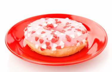 pink glazed donuts, with red hearts
