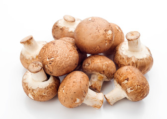 group of whole mushrooms isolated on white background