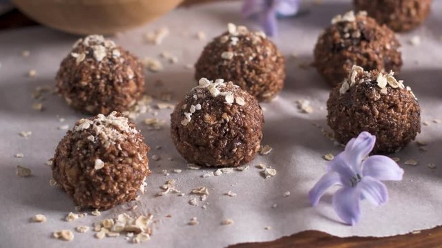Homemade fresh energy balls with chocolate.