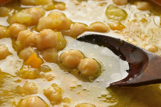 chickpea soup in a crock bowl close up
