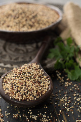 Mix of organic white, yellow and black quinoa, dietary and healthy food