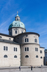 Fototapeta na wymiar Tourists and Salzburg Cathedral, Salzburg, Austria