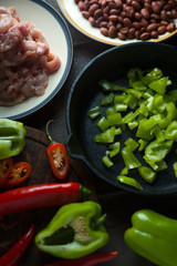 Ingredients for fajita on a cutting board.