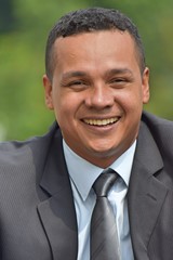 Smiling Young Business Man Wearing Suit And Tie