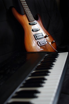 part of keyboard instrument and guitar