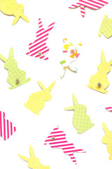 Easter bunny (Easter rabbit) craft of paper, isolated on white background. Festive decor of handmade. Pattern.