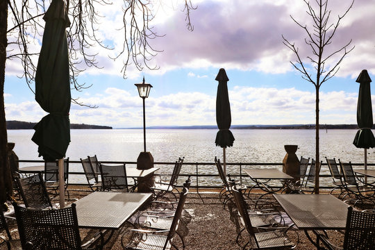 Panoramic winter view of Ammersee, Bavarian lake near Munich, from a restaurant terrace