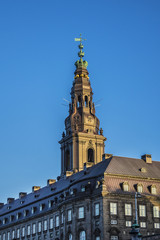 Obraz premium Tower of old Christiansborg Palace. Christiansborg Palace on Slotsholmen island, contains Danish Parliament (Folketinget), Supreme Court and Ministry of State. Copenhagen, Denmark.