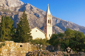 Fototapeta na wymiar View of Catholic Church of Saint Eustache (St. Eustahije) in Dobrota town, Montenegro