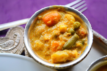 Macro photo of delicious Indian vegetable dishes with curry