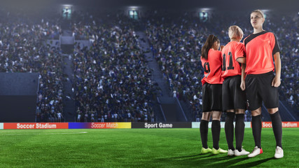 three female soccer players making wall before penalty shot