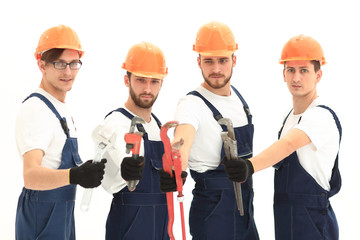 group of plumbers with working tools