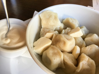 Russian pelmeni with butter