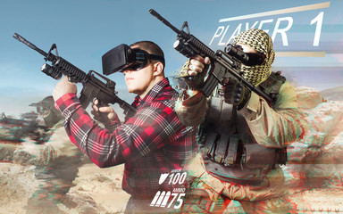 Vr gamer playing war game and aiming automatic rifle with fully equipped soldiers on desert...