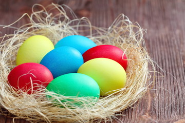 Easter eggs on wooden background