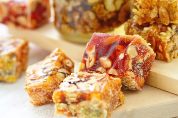 Nuts in honey and sweet marmalade with various nuts