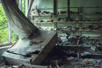 Ukraine, Pripyat -  bookcase in the school 3.