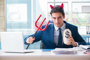 Devil angry businessman in the office