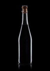 Homemade bottle of red wine with cork on black