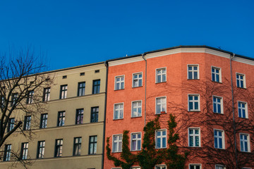 brown and red colored houses with clean darken sky as copy space