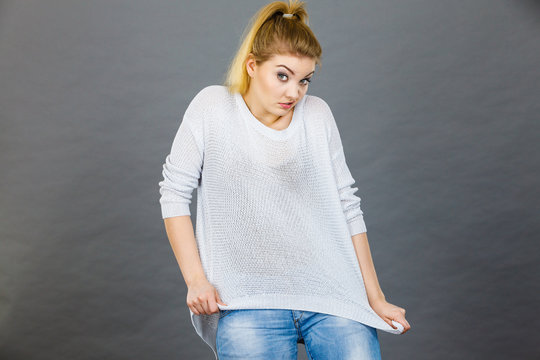 Woman Wearing Too Big Jumper