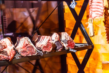 Beef dry aging rib eye on bone and rib in a special chamber.